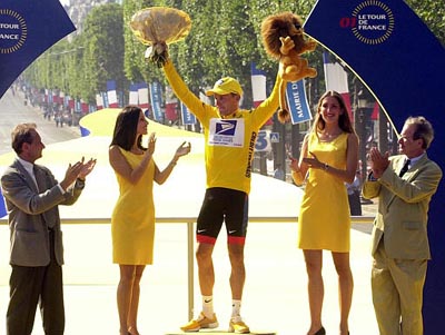 Lance Armstrong on the podium after winning